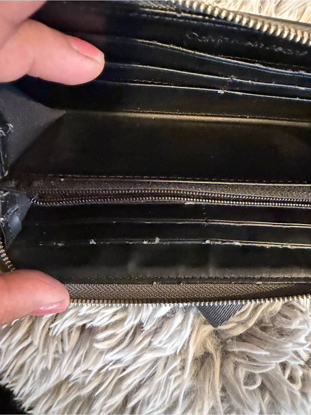 Calvin Klein Black Zip Wallet with Embossed cK